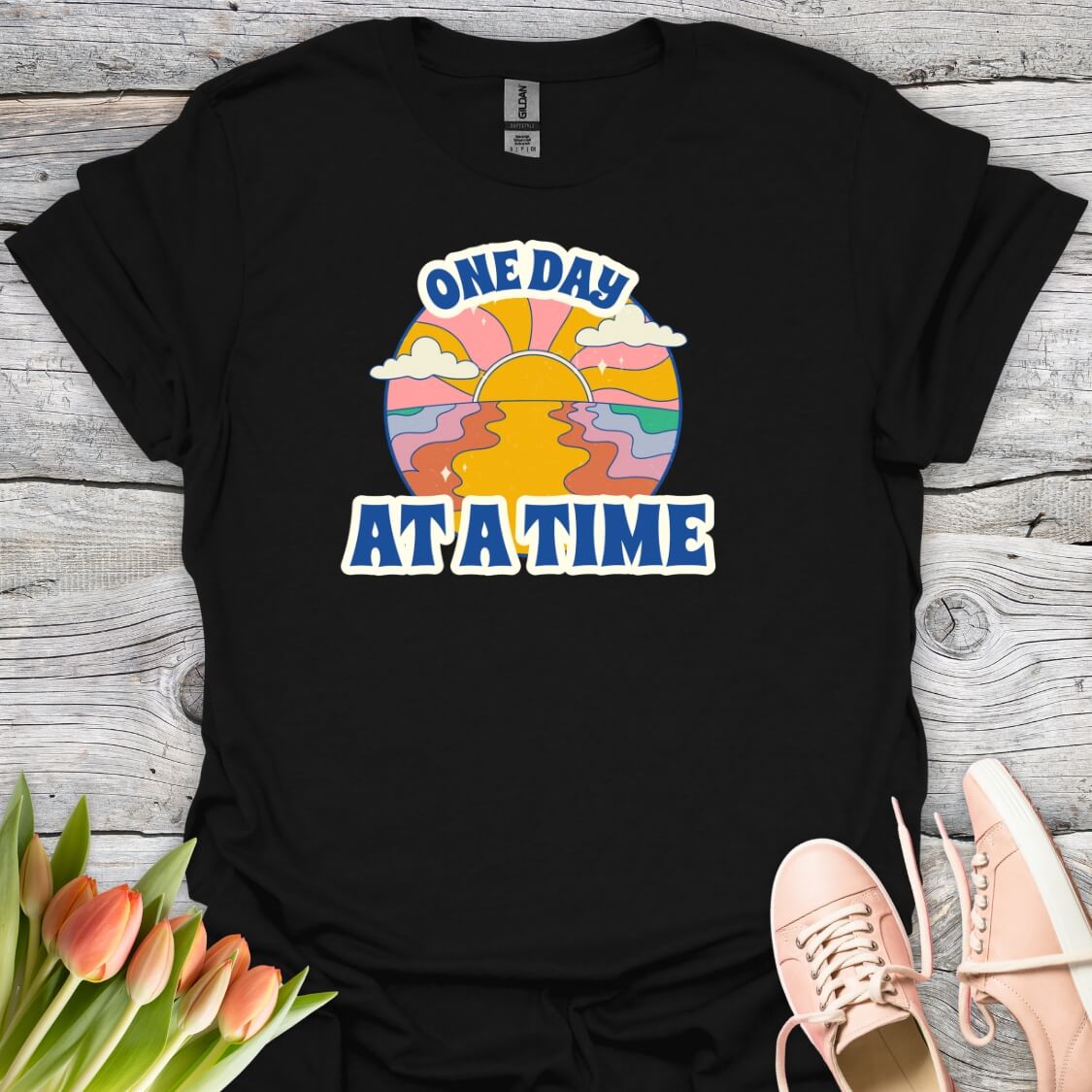 Black t-shirt with 'One Day At A Time' graphic design
