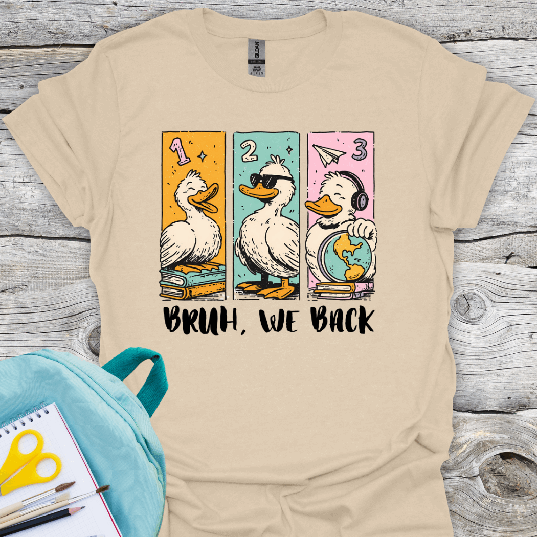 Beige t-shirt with cartoon ducks and 'BRUH, WE BACK' text, back to school